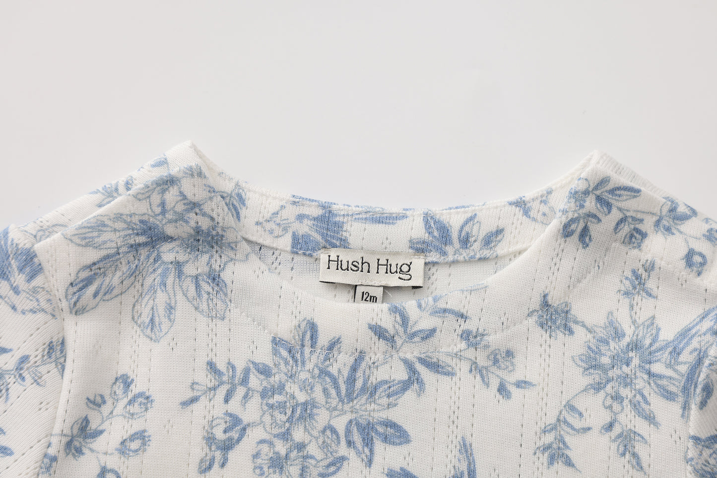 FLOWER PRINT SHORT SLEEVE BODYSUIT